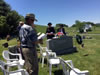 Chaplain Shirley Gordon and Regent Lavaughn Edwards conducting a grave-marking ceremony for Shirley's parents, Dr. Montague Cox, a Son of the American Revolution, and Jessie Gambill Cox (Moore), a Daughter of the American Revolution.